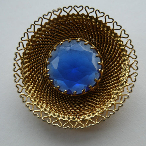 Vintage Costume Brooch with Heart Shapes on Rim and Blue Faceted Glass Insert