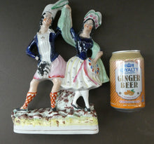 Load image into Gallery viewer, ANTIQUE Victorian Staffordshire Flatback Figurine. A Highlander and his Sweetheart Dancing. 10 inches
