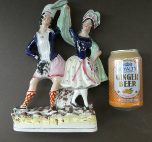 ANTIQUE Victorian Staffordshire Flatback Figurine. A Highlander and his Sweetheart Dancing. 10 inches