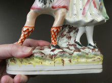 Load image into Gallery viewer, ANTIQUE Victorian Staffordshire Flatback Figurine. A Highlander and his Sweetheart Dancing. 10 inches
