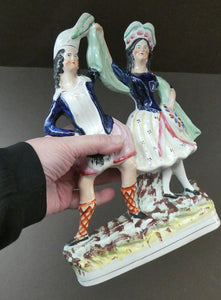 ANTIQUE Victorian Staffordshire Flatback Figurine. A Highlander and his Sweetheart Dancing. 10 inches