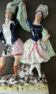 ANTIQUE Victorian Staffordshire Flatback Figurine. A Highlander and his Sweetheart Dancing. 10 inches