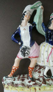 ANTIQUE Victorian Staffordshire Flatback Figurine. A Highlander and his Sweetheart Dancing. 10 inches