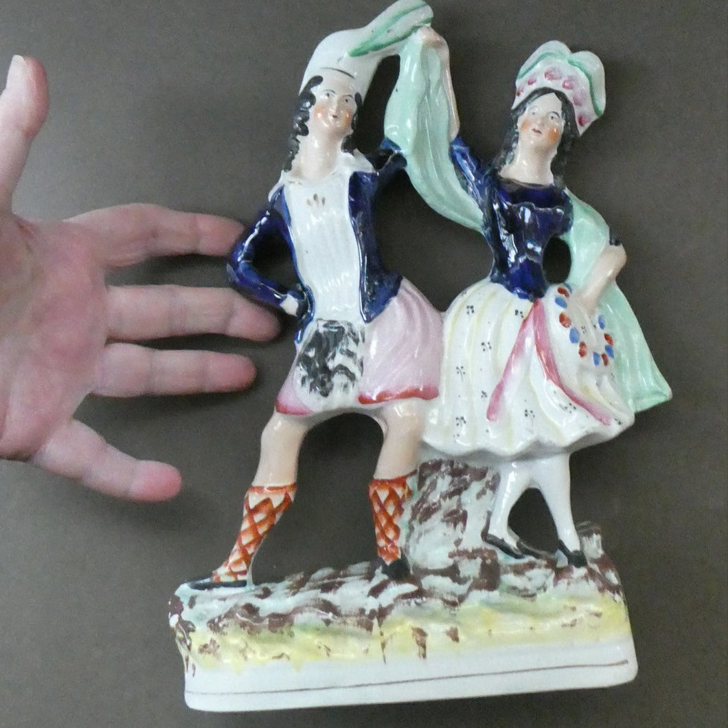 ANTIQUE Victorian Staffordshire Flatback Figurine. A Highlander and his Sweetheart Dancing. 10 inches