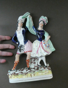 ANTIQUE Victorian Staffordshire Flatback Figurine. A Highlander and his Sweetheart Dancing. 10 inches