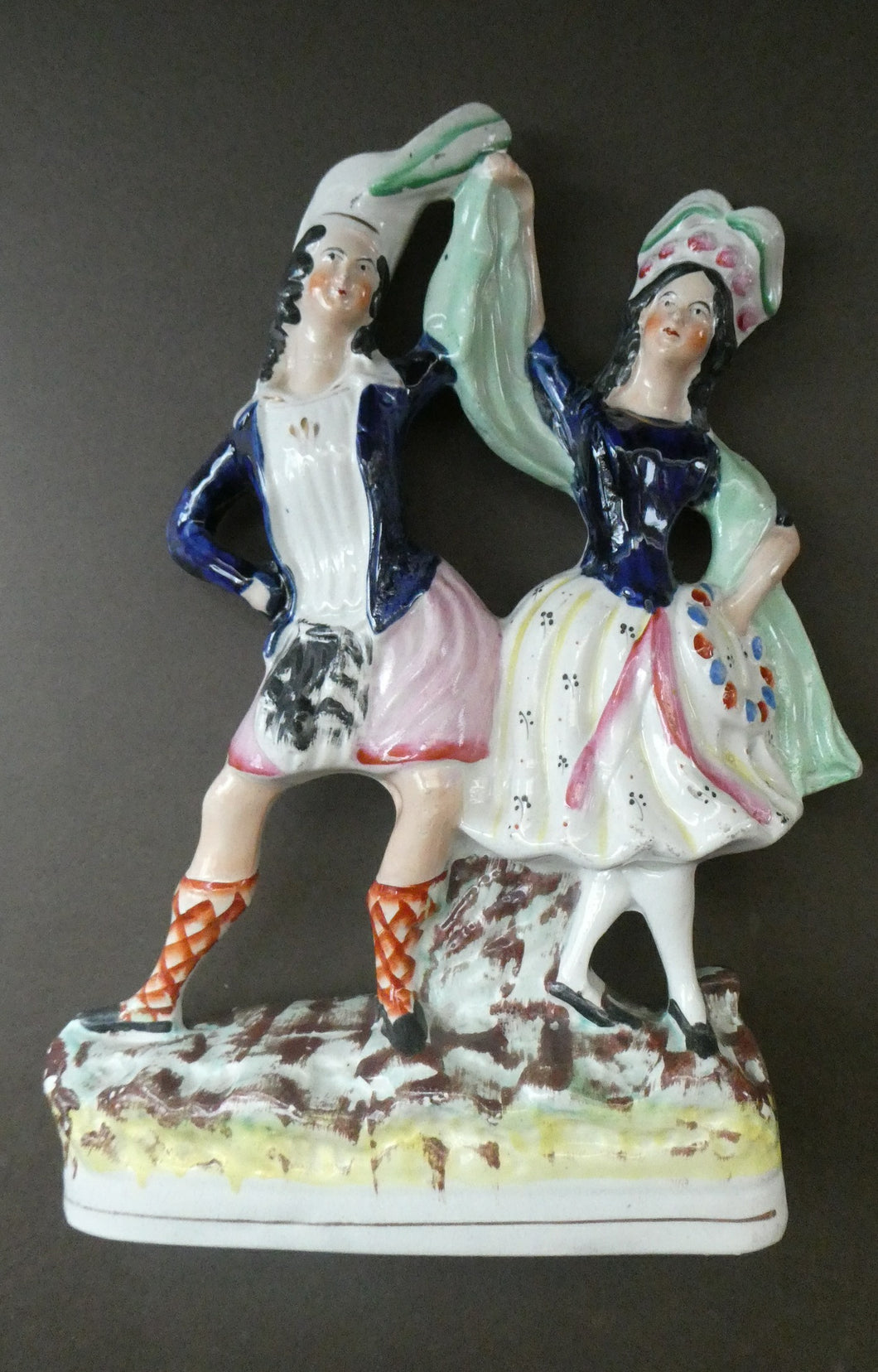 ANTIQUE Victorian Staffordshire Flatback Figurine. A Highlander and his Sweetheart Dancing. 10 inches