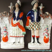 Load image into Gallery viewer, Large Matching Pair Staffordshire Figurines. Man and Woman at a Well with Goats. Antique 1860s
