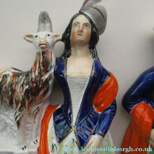Load image into Gallery viewer, Large Matching Pair Staffordshire Figurines. Man and Woman at a Well with Goats. Antique 1860s
