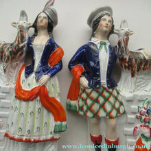 Load image into Gallery viewer, Large Matching Pair Staffordshire Figurines. Man and Woman at a Well with Goats. Antique 1860s
