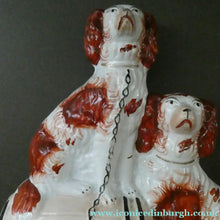 Load image into Gallery viewer, Antique Staffordshire King Charles Spaniel Dogs Sitting on Top of a Barrel. Genuine Victorian Figurine
