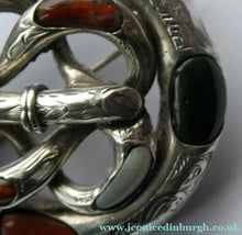Load image into Gallery viewer, Heavy 1880s SCOTTISH SILVER: Victorian Lover's Knot Brooch with Inset Specimen Agates

