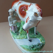 Load image into Gallery viewer, Genuine ANTIQUE STAFFORDSHIRE Figurine. Woman / Milkmaid with Large Cow by a Stream; 1880s
