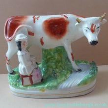 Load image into Gallery viewer, Genuine ANTIQUE STAFFORDSHIRE Figurine. Woman / Milkmaid with Large Cow by a Stream; 1880s
