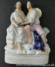 Load image into Gallery viewer, Antique 19th Century Staffordshire Figurine. Couple with a Nest 
