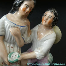 Load image into Gallery viewer, Antique 19th Century Staffordshire Figurine. Couple with a Nest 
