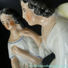 Load image into Gallery viewer, Antique 19th Century Staffordshire Figurine. Couple with a Nest 
