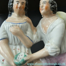 Load image into Gallery viewer, Antique 19th Century Staffordshire Figurine. Couple with a Nest 
