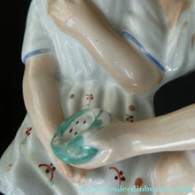 Load image into Gallery viewer, Antique 19th Century Staffordshire Figurine. Couple with a Nest 

