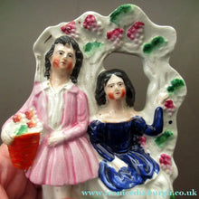 Load image into Gallery viewer, Antique Miniature Staffordshire Figurine. Couple Under a Fruiting  Vine

