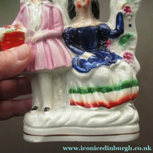 Load image into Gallery viewer, Antique Miniature Staffordshire Figurine. Couple Under a Fruiting  Vine
