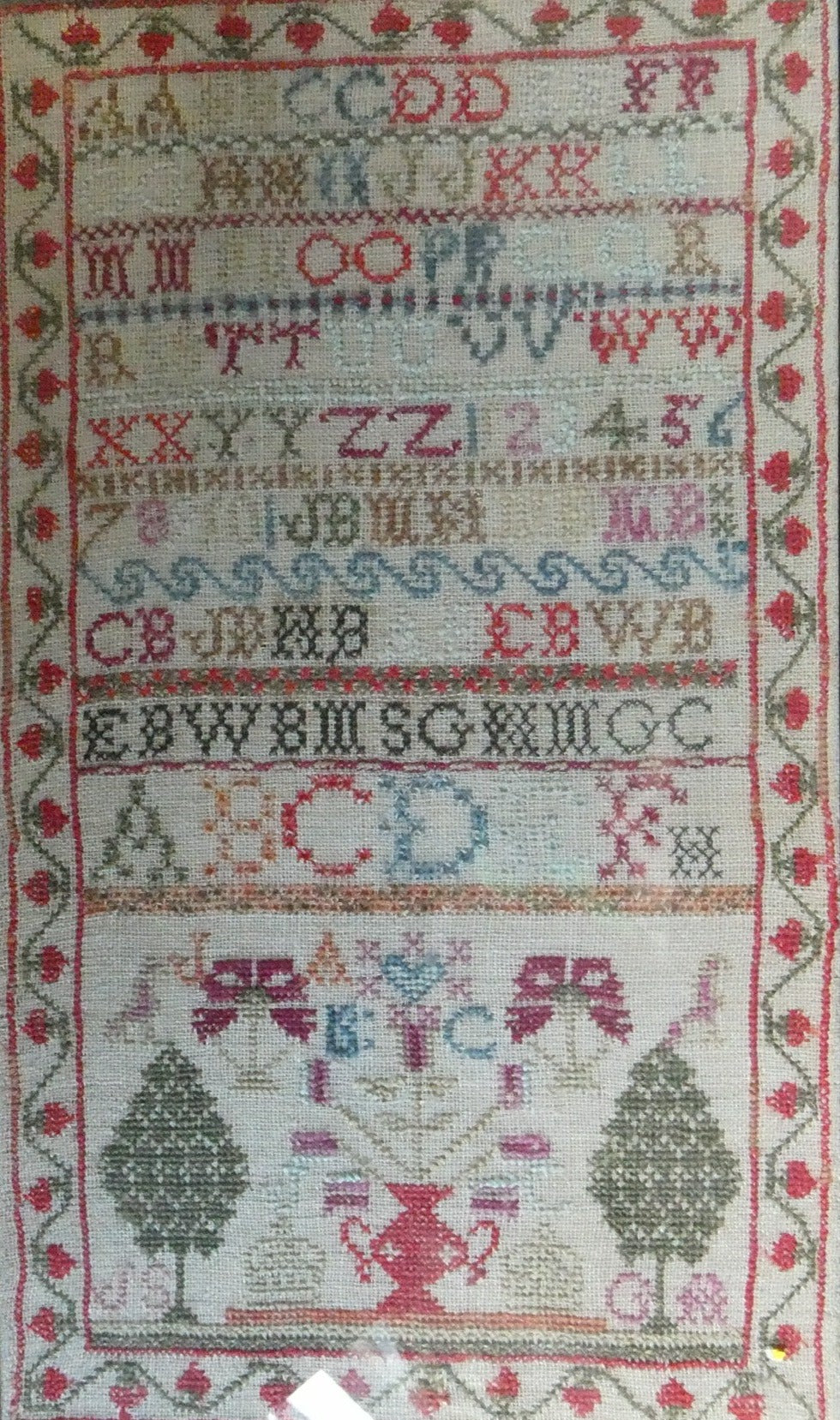 ANTIQUE 19th Century Embroidered Sampler with Letters and Floral Designs & Wild Strawberry Border