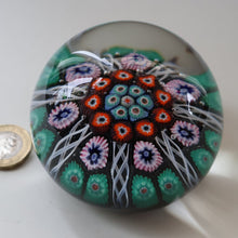 Load image into Gallery viewer, Fine VASART Scottish Glass Paperweight with 7 Short Spokes; with black ground, thick latticino spokes &amp; larger millefiori canes
