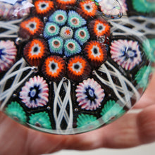 Load image into Gallery viewer, Fine VASART Scottish Glass Paperweight with 7 Short Spokes; with black ground, thick latticino spokes &amp; larger millefiori canes
