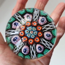Load image into Gallery viewer, Fine VASART Scottish Glass Paperweight with 7 Short Spokes; with black ground, thick latticino spokes &amp; larger millefiori canes
