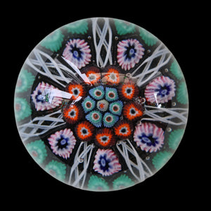 Fine VASART Scottish Glass Paperweight with 7 Short Spokes; with black ground, thick latticino spokes & larger millefiori canes