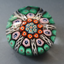 Load image into Gallery viewer, Fine VASART Scottish Glass Paperweight with 7 Short Spokes; with black ground, thick latticino spokes &amp; larger millefiori canes
