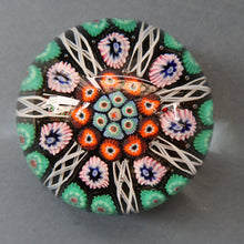 Load image into Gallery viewer, Fine VASART Scottish Glass Paperweight with 7 Short Spokes; with black ground, thick latticino spokes &amp; larger millefiori canes
