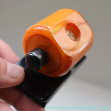 Load image into Gallery viewer, Extremely Rare 1930s Art Deco NO TRUMPS Amber / Butterscotch BAKELITE Marker with Rotating Wheel
