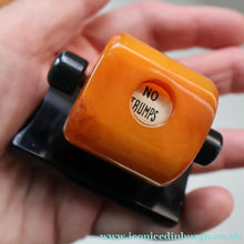 Load image into Gallery viewer, Extremely Rare 1930s Art Deco NO TRUMPS Amber / Butterscotch BAKELITE Marker with Rotating Wheel
