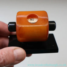 Load image into Gallery viewer, Extremely Rare 1930s Art Deco NO TRUMPS Amber / Butterscotch BAKELITE Marker with Rotating Wheel
