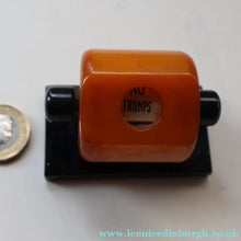 Load image into Gallery viewer, Extremely Rare 1930s Art Deco NO TRUMPS Amber / Butterscotch BAKELITE Marker with Rotating Wheel
