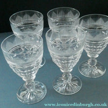 Load image into Gallery viewer, 1930s ART DECO Stuart Crystal FIVE Wine Glasses. With Cut Oval Facets and Engraved Fan Fringe Pattern. Height 4 1/2 inches
