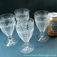 Load image into Gallery viewer, 1930s ART DECO Stuart Crystal FOUR Wine Glasses. With Cut Oval Facets and Engraved Fan Fringe Pattern. Height 5 3/8 inches
