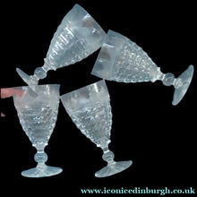 Load image into Gallery viewer, 1930s ART DECO Stuart Crystal FOUR Wine Glasses. With Cut Oval Facets and Engraved Fan Fringe Pattern. Height 5 3/8 inches
