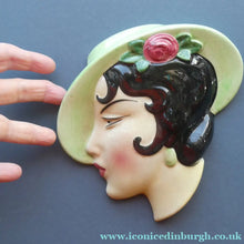 Load image into Gallery viewer, 1930s ART DECO Wall Mask by Cope &amp; Co. Art Deco Lady with Green Bonnet with Pink Flower. Black Hair
