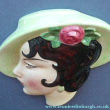 Load image into Gallery viewer, 1930s ART DECO Wall Mask by Cope &amp; Co. Art Deco Lady with Green Bonnet with Pink Flower. Black Hair
