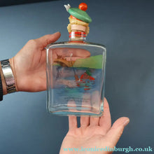 Load image into Gallery viewer, 1930s NOVELTY Golfing Glass Decanter. Decorated with Hand-Painted Comical Golfing Illustration - and with Fabulous Scotsman's Head Stopper
