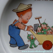 Load image into Gallery viewer, 1930s SHELLEY POTTERY Mabel Lucie Attwell Heavy Baby Plate. Gardening Image with Boo Boos in Wheelbarrow
