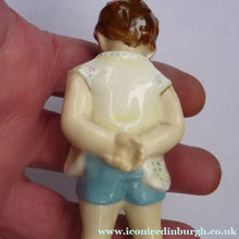 Load image into Gallery viewer, 1950s Freda Doughty Royal Worcester Figurine: TOMMY 2913. Issue with brown hair, yellow shirt and blue shorts
