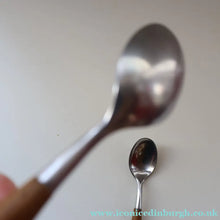 Load image into Gallery viewer, 1950s. PAIR of Vintage DANSK Fjord Pattern Dessert or Soup Spoons. Stainless Steel with Teak Handles. 7 1/8 inches

