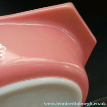 Load image into Gallery viewer, Two Pyrex Dishes. No Lids. Black Oblong. Pink Oval. Snowflake Pattern
