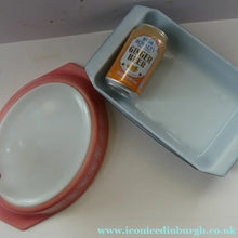 Load image into Gallery viewer, Two Pyrex Dishes. No Lids. Black Oblong. Pink Oval. Snowflake Pattern

