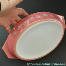 Load image into Gallery viewer, Two Pyrex Dishes. No Lids. Black Oblong. Pink Oval. Snowflake Pattern
