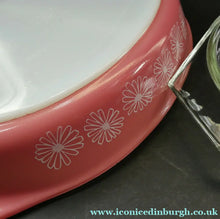 Load image into Gallery viewer, Two Pyrex Dishes. No Lids. Black Oblong. Pink Oval. Snowflake Pattern
