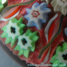 Load image into Gallery viewer,  VASART Scottish Glass Paperweight with 9 Spokes; with rose pink ground, latticino canes &amp; millefiori rosette
