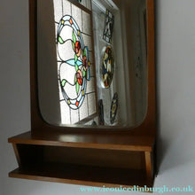 Load image into Gallery viewer, 1960s DANISH Pedersen &amp; Hansen (P&amp;H) wall mirror in a teak wooden frame with a small integrated shelf
